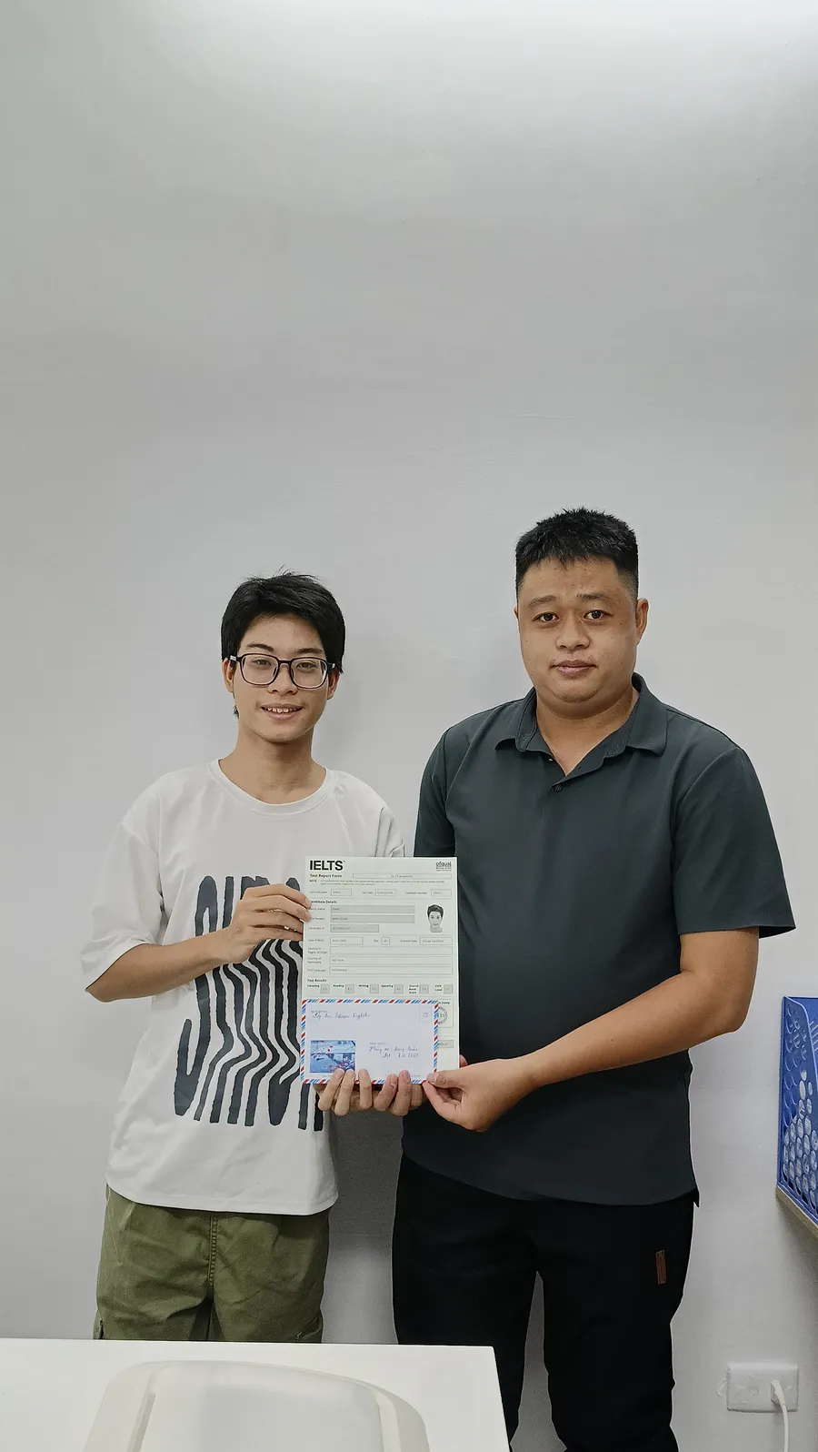 Đặng Quân cùng thầy giáo